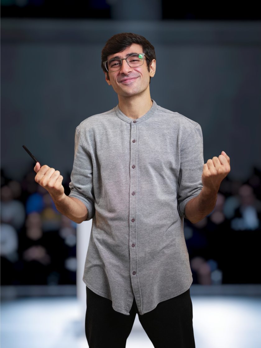 Smayan on stage in front of an audience